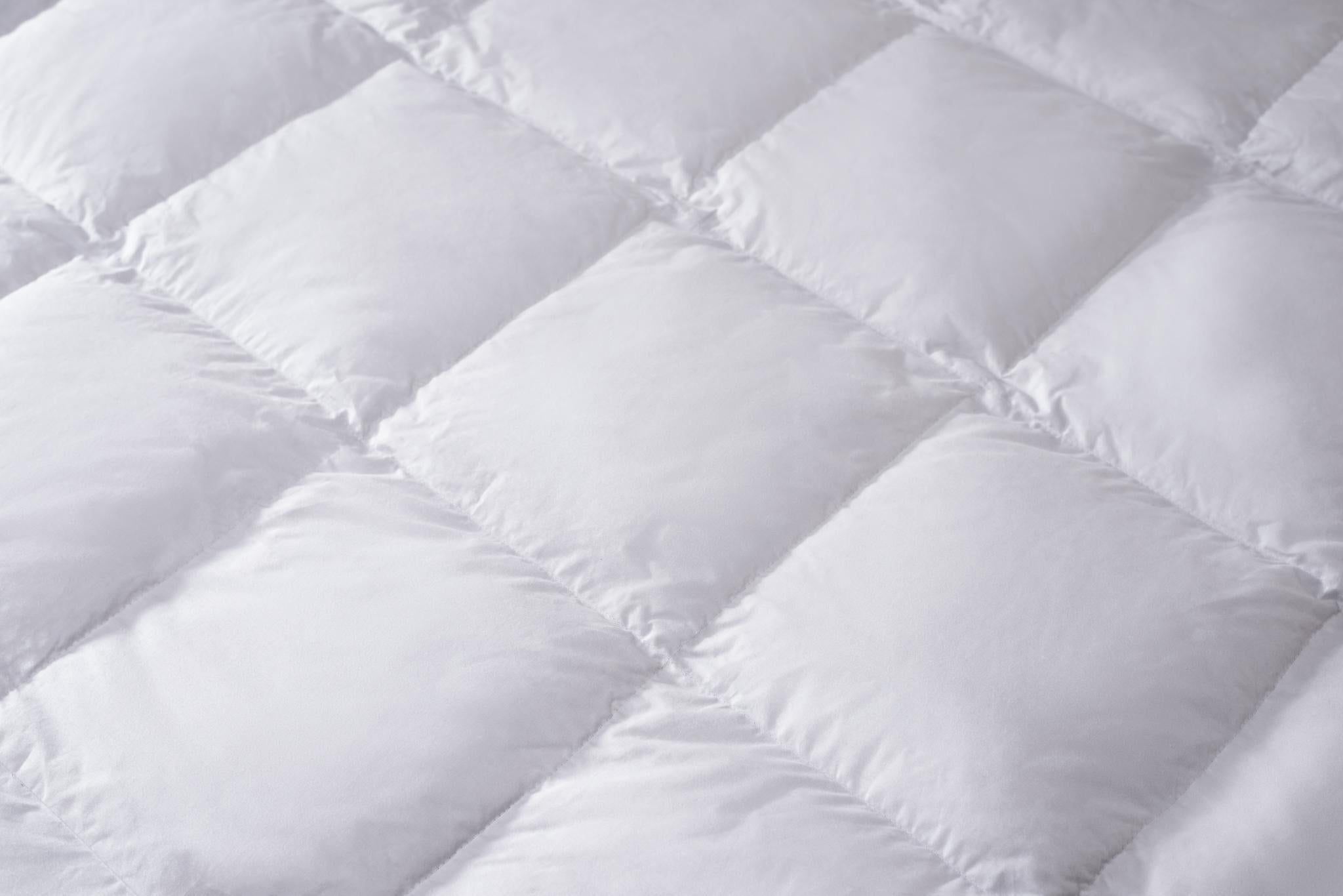 Collection de couettes haut de gamme naturelles ou synthétiques