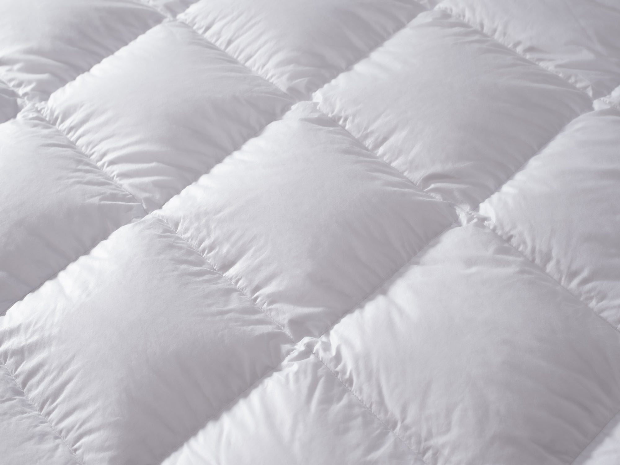 Collection de couettes haut de gamme naturelles ou synthétiques