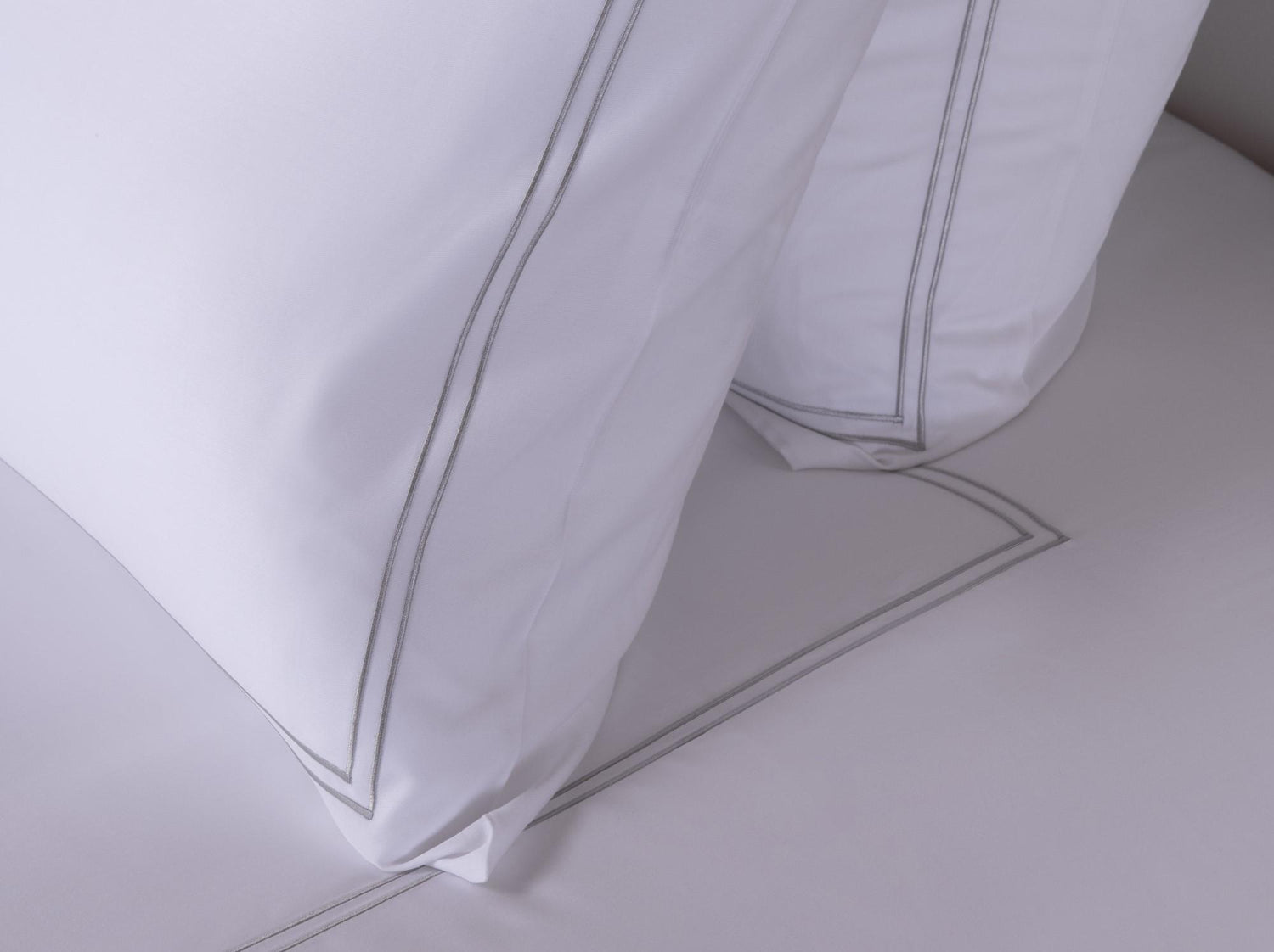 Finitions luxe de la taie d'oreiller Harmonie